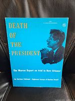 Front cover showing title, image of JFK, subtitle text