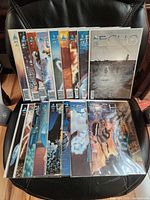 All 17 Echo comics displayed on chair