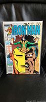 Front cover of Marvel Iron Man #195 comic book in sleeve
