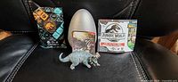 Full set showing figure, egg container, foil pack and leaflet