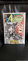 Front cover showing Action Comics #645 in bag with clear view of artwork and issue number