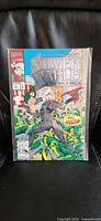 Front view of Silver Sable & The Wild Pack #1 in protective sleeve