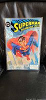 Full front view of bagged Superman The Man of Steel #1 comic