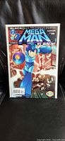 Front cover of Mega Man #28 comic in protective sleeve