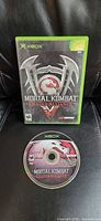 Front cover of Xbox game case and disc