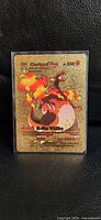 Front of gold Charizard VMAX fan art card showing artwork, HP and attack details