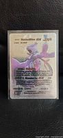 Front view of sleeved holographic Mewtwo & Mew GX Tag Team fan art card