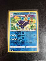 Front of sleeved Whiscash reverse-holo card showing artwork, number 036/189, 120 HP