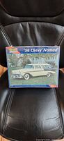 Front of sealed model kit box showing car artwork and branding