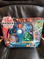 Front of sealed Bakugan Battle Pack showing figures and branding
