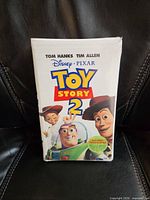 Front view of sealed Toy Story 2 VHS showing artwork and shrinkwrap condition