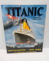 Front of metal Titanic sign showing artwork and text