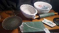 Full lot showing marble board, rolling pin, ceramic bowls, decorative plate, glass stand