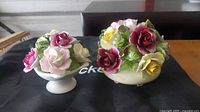 Both bone china posy bowls showing size difference and floral detail