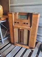 Front view of wood floor console radio