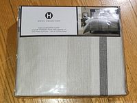 Front of sealed package showing brand, size, pattern