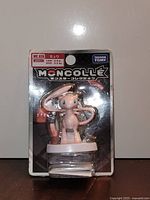 Front view of sealed Takara Tomy Moncolle MC-028 Mew figure in blister pack