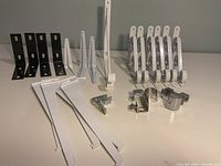 All brackets and mounting clips arranged on tabletop