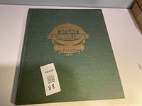 Front cover showing title and green cloth binding