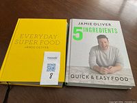 Front covers of both Jamie Oliver cookbooks