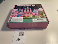 Closed retail box showing Magnetic Blocks branding and safety warning