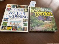 Front covers of both hardcover gardening books showing titles and authors