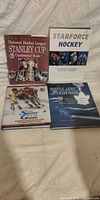 Front covers of all four hockey books