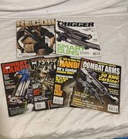 All six magazines fanned out showing covers