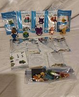 Six Nanoblock Pokémon retail pouches, assembled figures, instruction sheets and zip bag of loose bricks