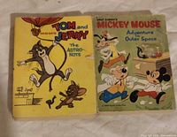 Front covers of both vintage cartoon books