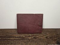 Closed maroon case front