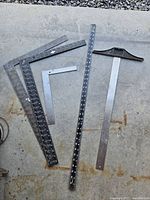 All measuring tools laid out on concrete floor