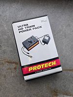 Front of retail box showing model PT2000 Ultra HO Train Power Pack