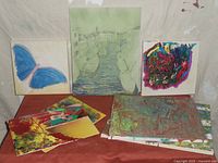 Overview showing six of the unfinished canvases