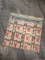 Front of sealed package showing MacEwen Petroleum Inc. label and design