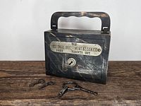 Front view of coin bank with keys