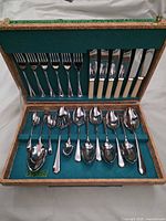 Full case open showing all flatware pieces