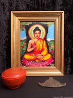 All three items together: framed Buddha portrait, lacquer bowl with lid, bronze gong