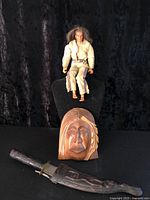 Overall lot showing figure, wood carving and knife with sheath
