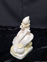 Front view of Belleek Leprechaun Pot O Gold figurine