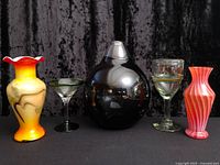 Front view of all five blown glass pieces