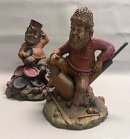 Front view of both Tom Clark gnome sculptures Smoky and Chubby