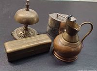 Front view of all four metal items