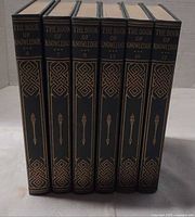 Front spines of six volumes showing titles and volume numbers