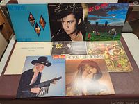 All eight LP covers laid out