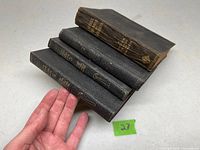 Four Audels guide books stacked, exterior view