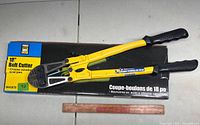 Bolt cutter placed on top of its original box