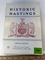Front cover of Historic Hastings hardcover book showing title, crest and author