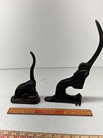 Both presses side by side with ruler for scale