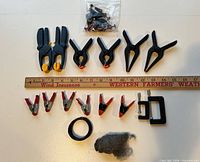 All items laid out beside ruler showing sizes